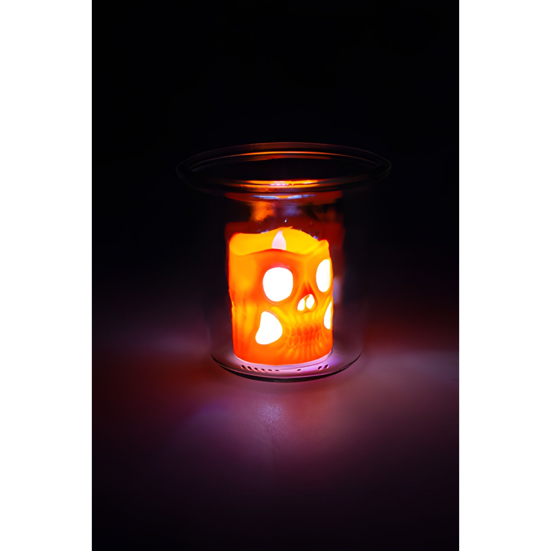 LED-Kerze 'Totenkopf' 6 x 6 cm, mit Farbwechsel, orange